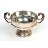 A silver twin-handled pedestal bowl, apparently D.&J. Wellby, London, probably 1933, 23.5cm. wide