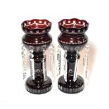 ^ A pair of ruby glass drop lustres, 38cm high