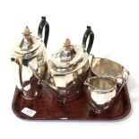 A four piece silver tea service, Roberts & Belk, Sheffield 1925, of panelled oval form, the covers
