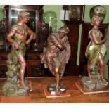 ^ A pair of French spelter figures, 'Glorification du Travail' and 'Genie du Travail', 61cm high;