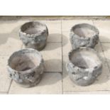 A set of four composition garden planters, 37cm by 31cm