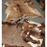 Hides/Skins: Four Tanned Animal Hides, circa late 20th century, to include - Cape Greater Kudu