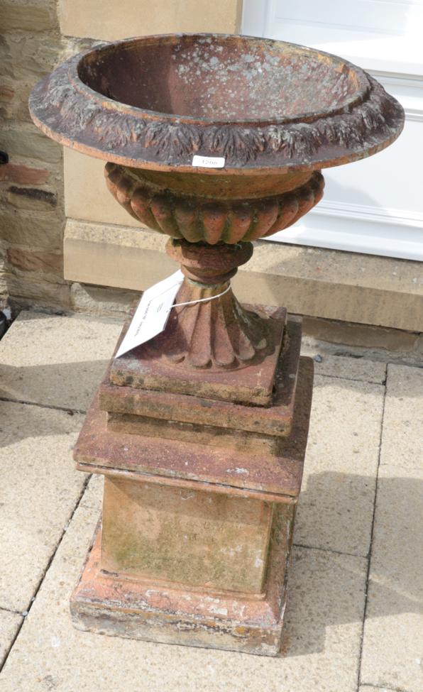 A 19th/early 20th century garden urn stamped Goy, 54cm by 99cm