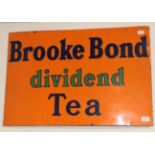 ^ A single sided enamel advertising sign, Brookbonde Dividend Tea, 50cm by 76cm