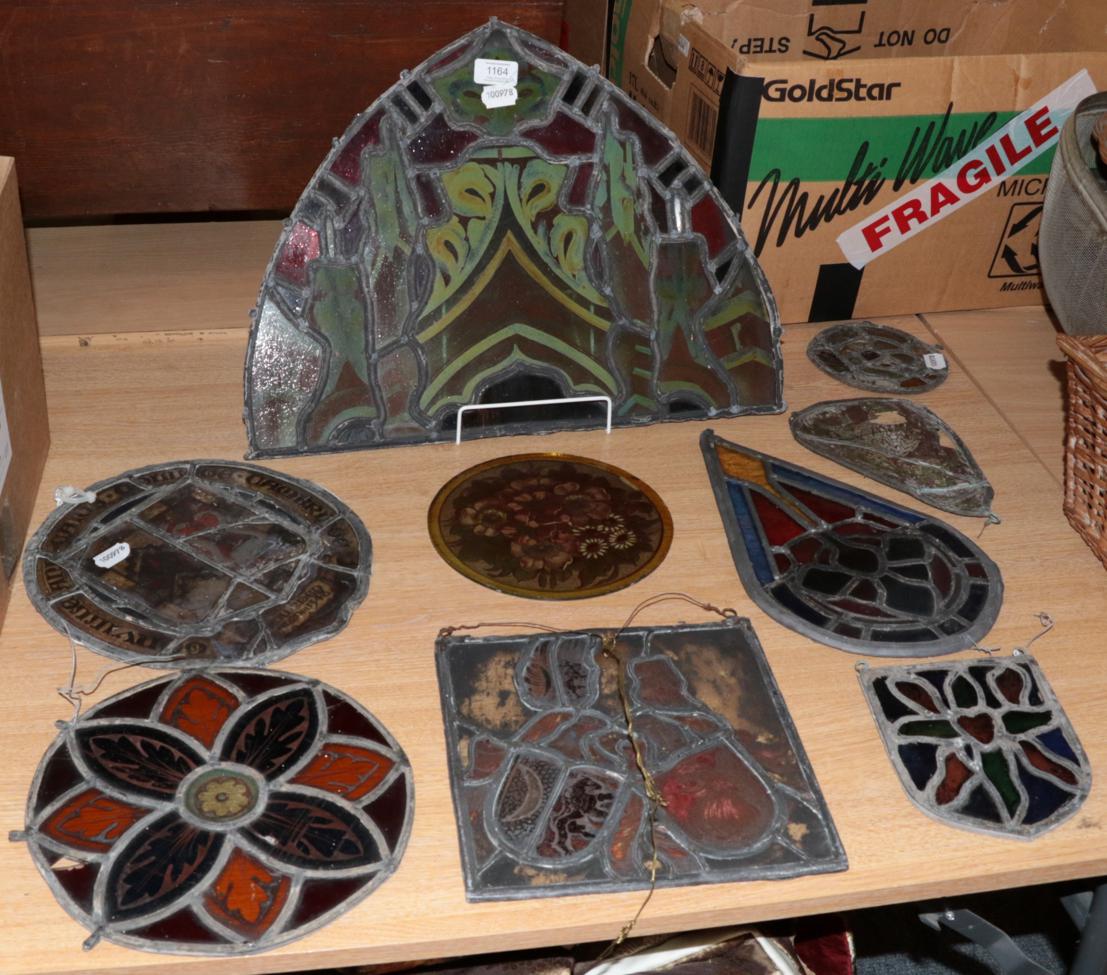 ~ Nine assorted leaded glass panels of various sizes and shapes