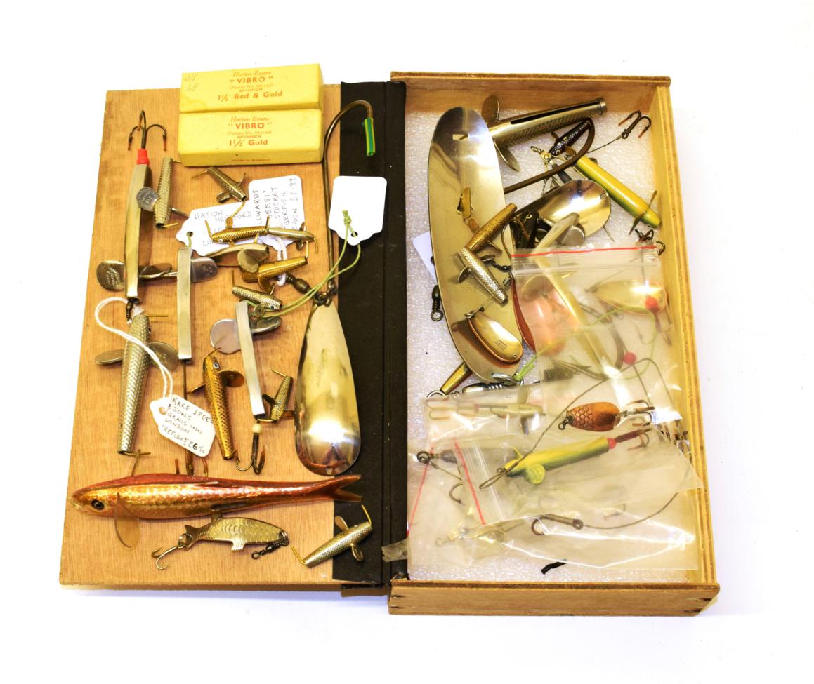 A collection of approx. fifty-six named vintage fishing lures, including reflex, spoon, minnow and