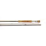 A Hardy Demon Sintrix 330 three-piece trout fly rod, 10 ft., #7, serial No. DE10 Z183, cloth bag,