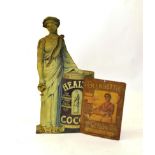 A figural advertising tin sign for 'Health' Cocoa made by H. Thorne & Co. Leeds; together with