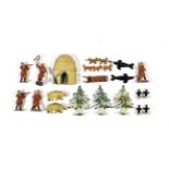 Timpo Arctic Series four figures, a musher, sled and dogs (dog train broken in half), three trees,