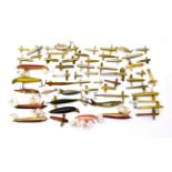A collection of vintage fishing lures, unnamed, including approx. forty brass and other metal