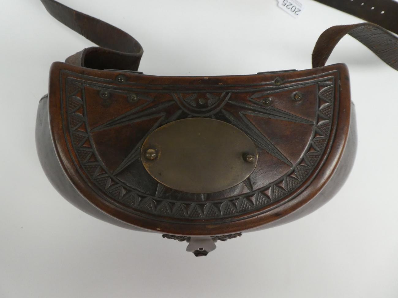 A good 18th century leather pot-bellied fishing creel, the hinged cover tooled with a sunburst - Image 6 of 7