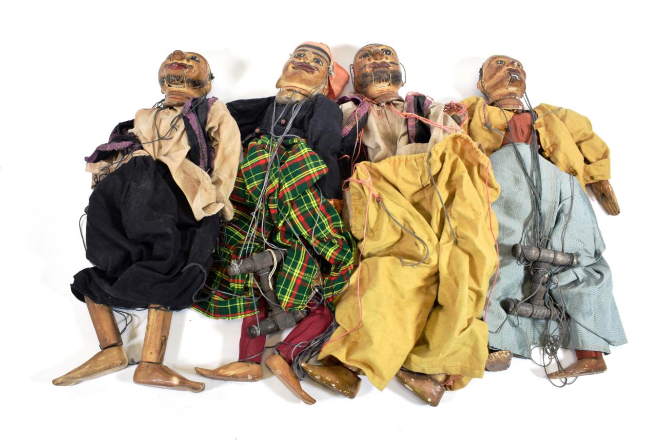 Marionettes A Collection Of Four Large Wooden Indian Figures with working mouths approx 20'', 51cm