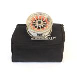 A Hardy Demon 7000 aluminium fly reel, serial No. J18385, fitted with line, with two spare spools,