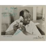 Louis Armstrong Autographed Photograph black and white, hand signed 'To Morag from Louis