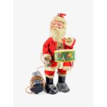 Made In Japan Battery Operated Remote Control Santa Claus playing a drum and bell, with celluloid
