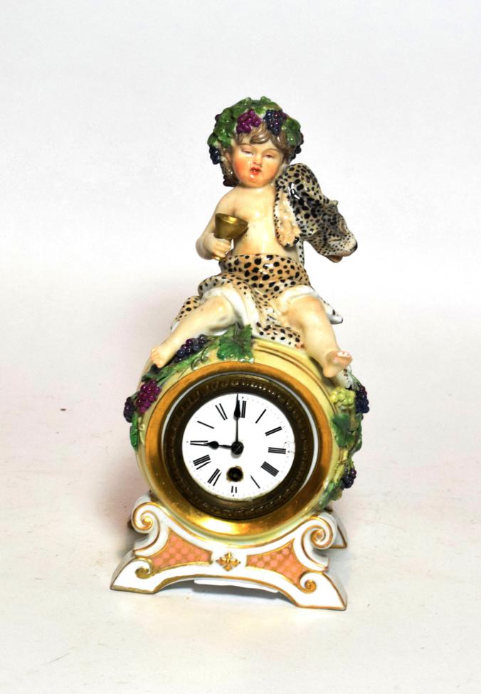 A Continental porcelain mantel timepiece