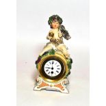 A Continental porcelain mantel timepiece