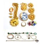 Assorted costume jewellery including three silver bangles; three silver brooches; a Christian Dior