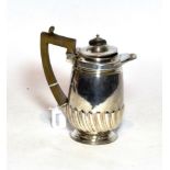 A silver coffee/hot water jug, London, 1897, gross weight 12.6ozt