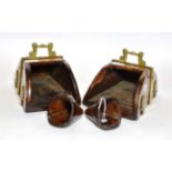 A pair of late 19th century Spanish walnut stirrups, each with burred steel tread, brass suspender