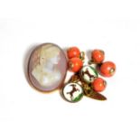 A cameo brooch; a pair of Essex crystal style cufflinks; and five coral buttons/drops