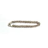 A platinum fancy link bracelet, length 19cm . Gross weight - 16.0 grams.