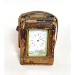 A brass carriage timepiece with cylinder escapement and painted dial