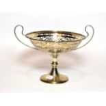 An Edwardian silver twin handled pedestal bowl, by Hammond, Creake & Co., Sheffield, 1909, pierced