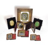 Collection of seven ambrotypes, framed photograph, two papier mache frames and a silhouette