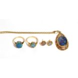 A suite of opal triplets comprising a pendant on chain, a pair of stud earrings and two 9 carat gold