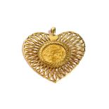 A 1912 half sovereign in a 9 carat gold heart shaped pendant, measures 4.2cm by 4.7cm . Gross weight