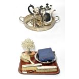 Circular plated gallery tray; teapot; coffee pot; teaspoons; chamberstick; silver mounted brush set;