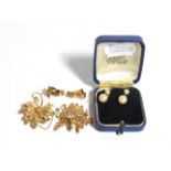 Two 9 carat gold brooches; a pair of 9 carat gold earrings; and two pairs of cultured pearl earrings