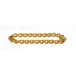 A curb link bracelet, marks rubbed . Gross weight 29 grams. No fastening, goes over the hand.
