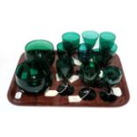 A group of early to mid 19th century green glass wines, various shapes, and two similar rinsers