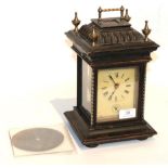 A musical alarm mantel timepiece, with three symphonium discs The case is rubbed. The edges are