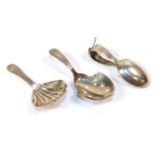 Two George III silver caddy spoons, comprising: one with pierced bowl and Old English pattern