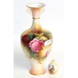 A Royal Worcester vase decorated with roses, signed Austin, model number 289; and a small