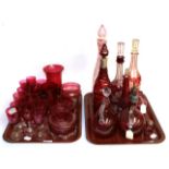 Two trays of 19th century ruby and cranberry glass including decanters, wines, vases etcSome items