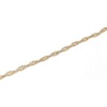 A 9 carat gold reef knot link necklace, length 80cm . Gross weight 33.94 grams.