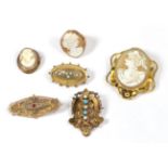 A 9 carat gold cameo ring, finger size L1/2; a cameo brooch, stamped '9C'; a larger cameo brooch,