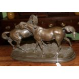 After P.J. Mene, an animalier bronzed resin horse group on integral base