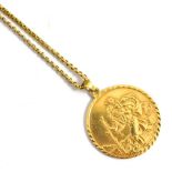 A 9 carat gold St Christopher on chain and a gents 18 carat gold wedding band