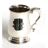 A George II silver mug, maker's mark rubbed, London, 1759, baluster and on spreading foot, with