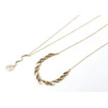 A 9 carat gold diamond set necklace, length 41cm; and a 15 carat gold blister pearl pendant on a 9