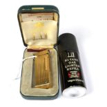 A Dunhill ''Rollagas'' lighter, box and accessories