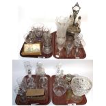 Four trays of Victorian and later glass including hurricane vases, drinking glasses, candlesticks,