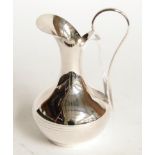 An Elizabeth II silver jug, by Victoria Silverware Ltd., Birmingham, 2003, baluster and with