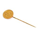 A 1909 half sovereign coin stick pin, in a Spink & son Ltd box. Gross weight 4.94 grams. Possibly