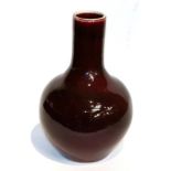 A Chinese sang de boeuf, globular bottle vase, 35cm highMain body with one firing blemish. The top